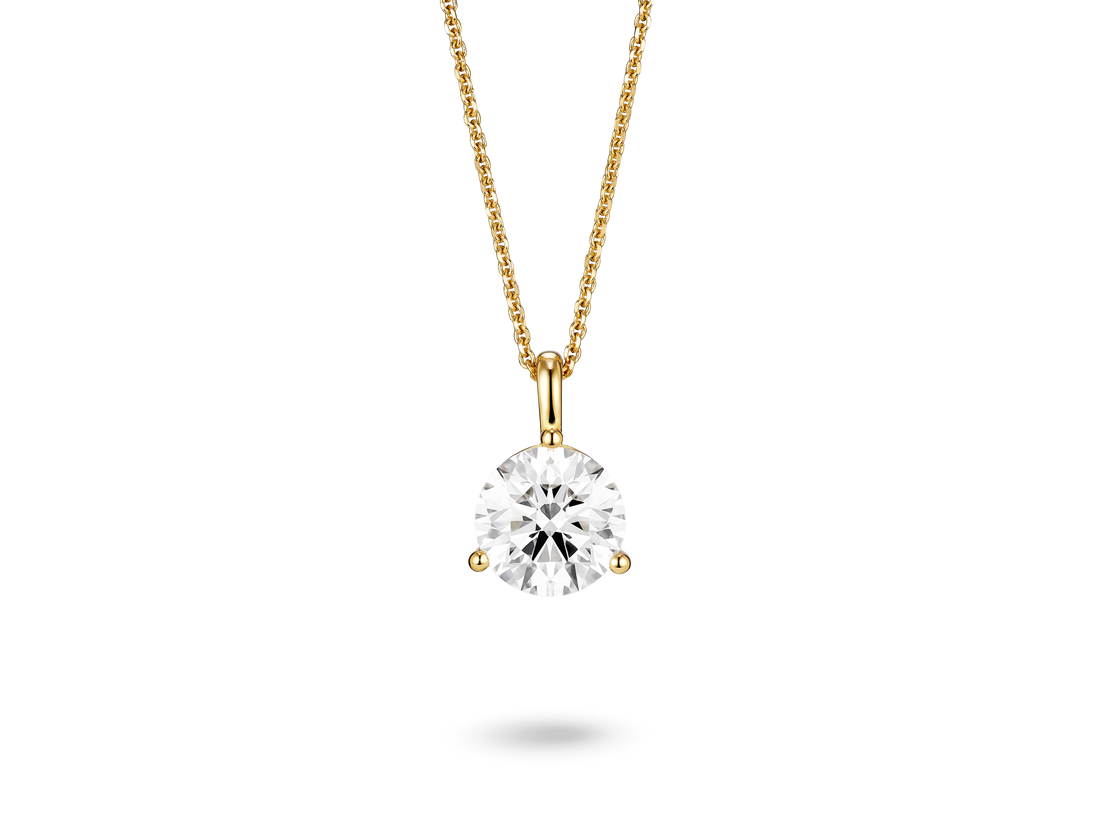 Front view of a lab-grown 2 carat round brilliant solitaire on a bale pendant in yellow gold